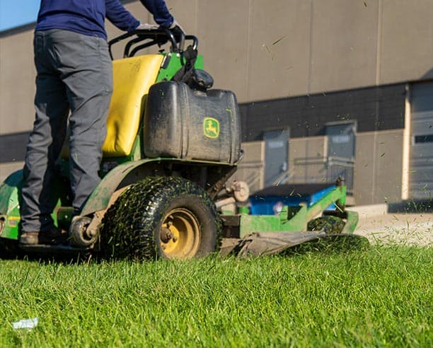 Lawn Mower On Green Grass